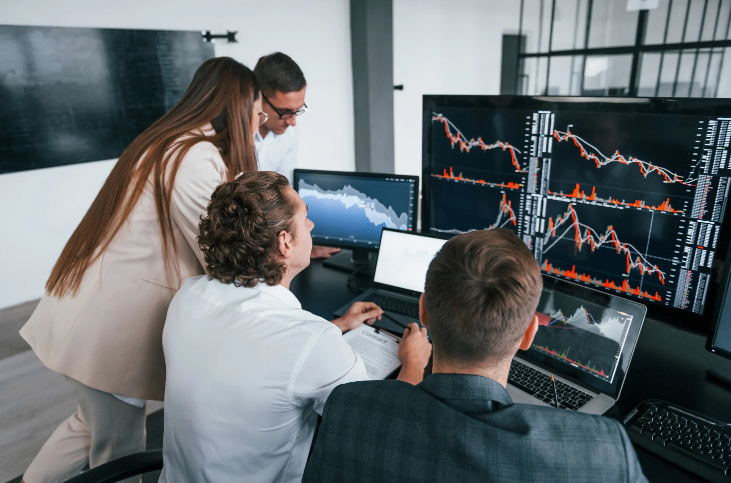 a group of people looking for Trade Signal