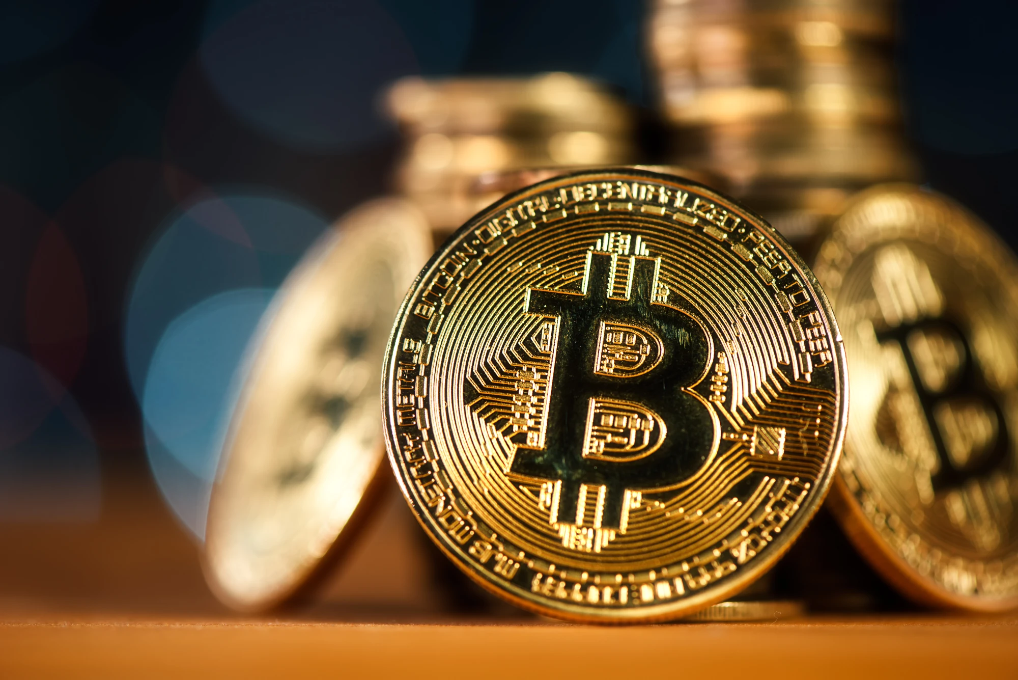 A close-up of a silver Ethereum coin with a futuristic blue background and free forex signals